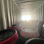 un container remplit de barils a destination de la Côte d'Ivoire